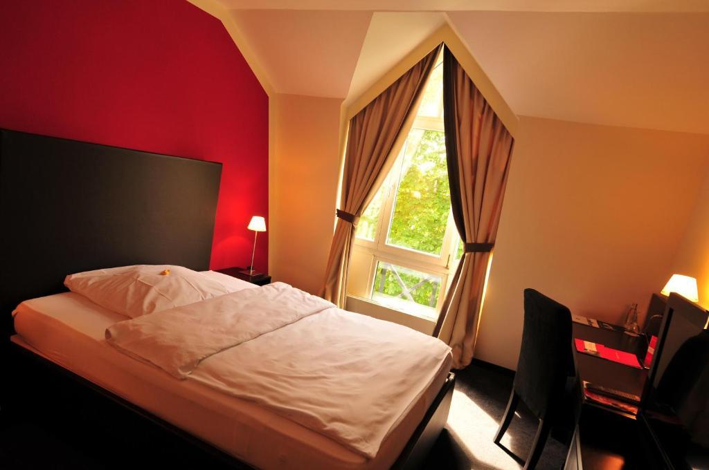 Hotel Am Ruhrufer Business & Golf مولهايم ان الرور دير الغرفة الصورة